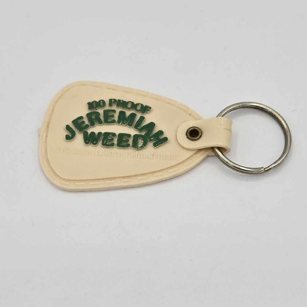 Vtg 100 Proof Jeremiah Weed He was a hellava good railroad man key ring fob
